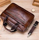 Bolsa masculina tipo maleta BULLCAPTAIN em couro com alças de mão e ombro